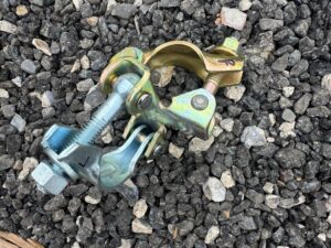 Side view of drop forged prop to tube double coupler