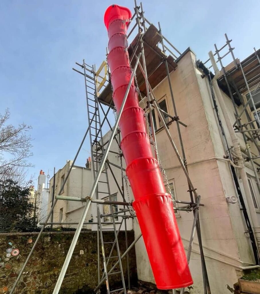 Def Chute Rubbish Chute System Attached to a Scaffold in Brighton