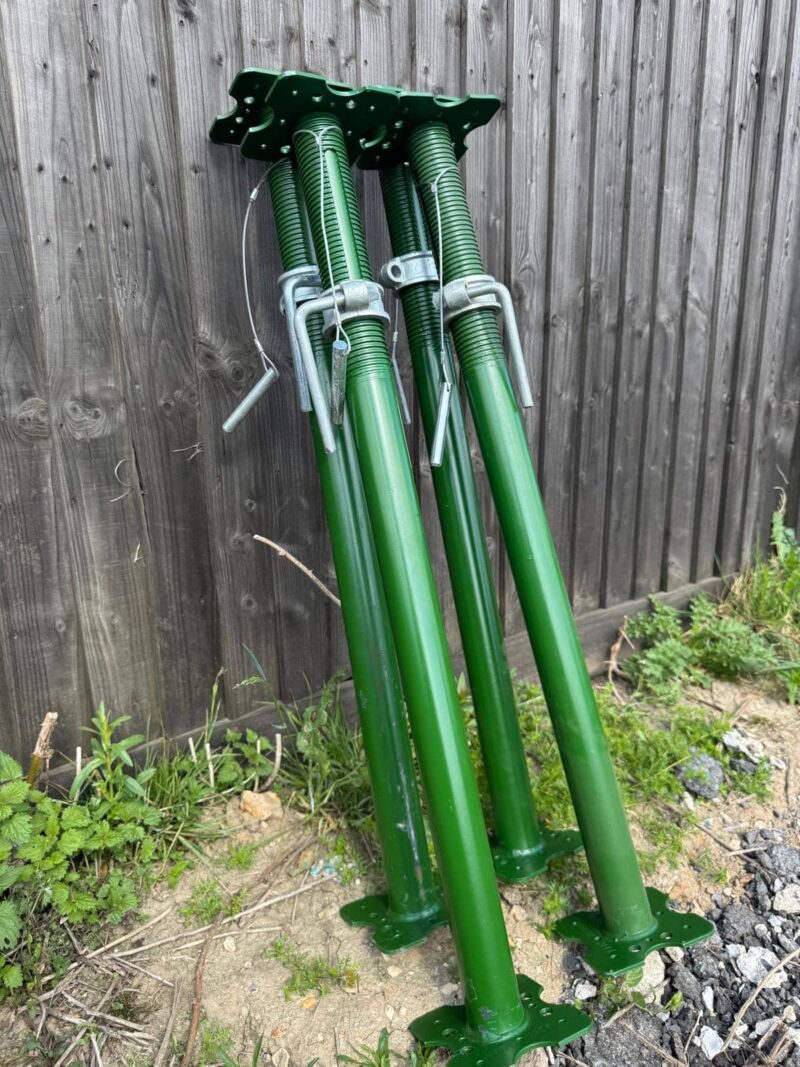 Four green Size 2 acrow props (1.98m–3.35m) ready for sale
